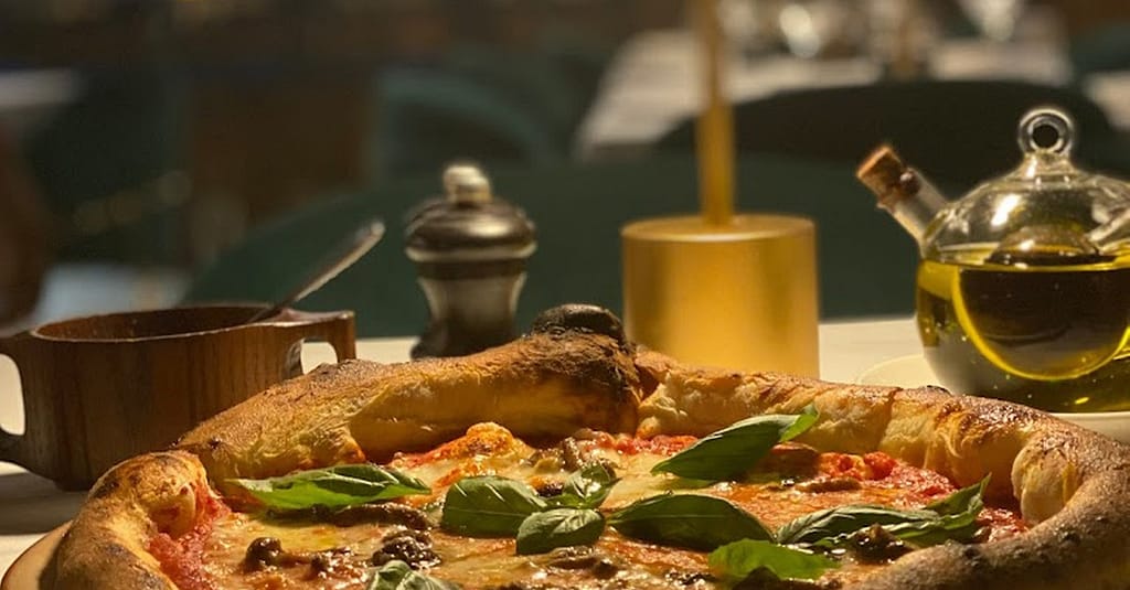 Choice Of Pizza(S) For Four People With House Beverages Dubai restaurants Shop Online at Dubai Trades 11