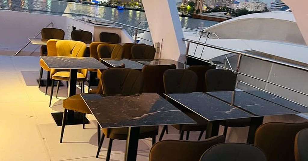 Dine, Dance, And Delight: Dubai Canal Dinner Dhow Cruise Dubai restaurants Shop Online at Dubai Trades 3