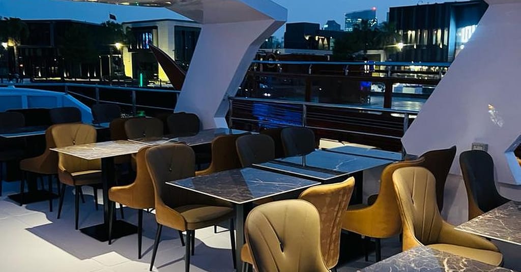 Dine, Dance, And Delight: Dubai Canal Dinner Dhow Cruise Dubai restaurants Shop Online at Dubai Trades 4