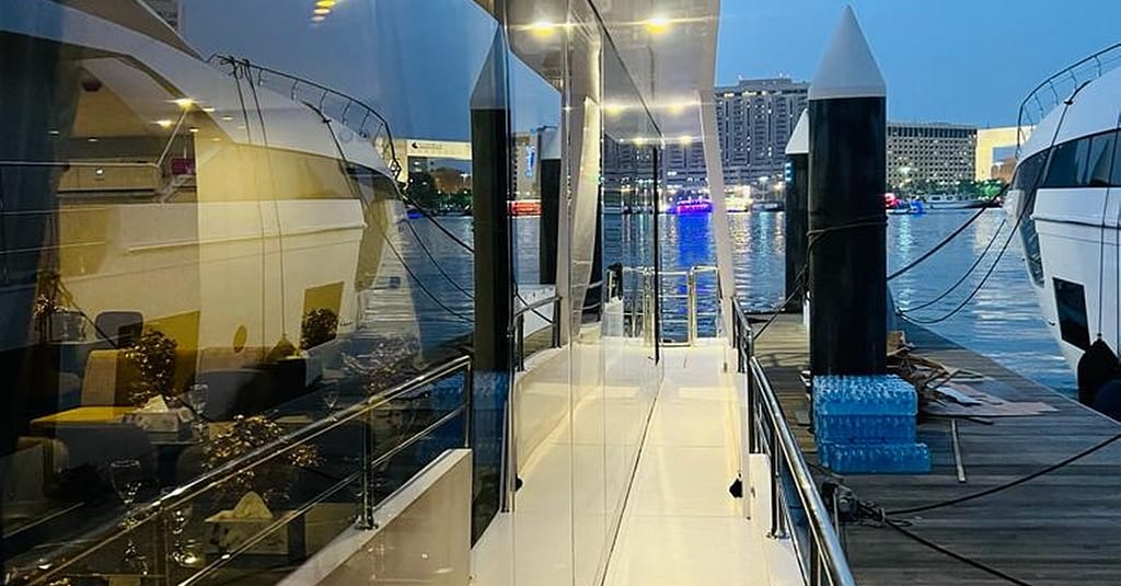 Dine, Dance, And Delight: Dubai Canal Dinner Dhow Cruise Dubai restaurants Shop Online at Dubai Trades 7