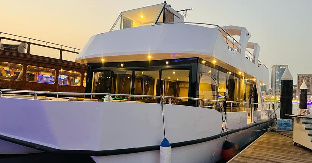 Dine, Dance, And Delight: Dubai Canal Dinner Dhow Cruise Dubai restaurants Shop Online at Dubai Trades 2