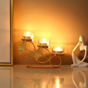 3 Golden Candle Holders Shaped Like Ginkgo Leaves. Candlesticks Shop Online at Dubai Trades