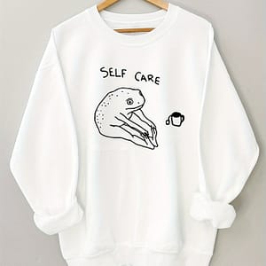 Women’s Self Care Graphic Long Sleeve Sweatshirt – Cute Frog & Coffee Cup Design, Soft Beige Round Neck Pullover, Machine Washable Casual Clothing, Ladies Sweatshirts Clothing Shop Online at Dubai Trades