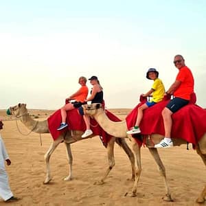 Camel Ride Safari in Red Dunes at Burj Khalifa Tower, Dubai, United Arab Emirates Activities Shop Online at Dubai Trades