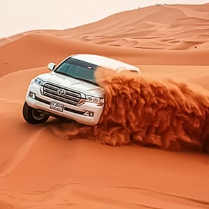 Evening Desert Safari + Bbq, Sandboarding & Camel Ride For Up To 6 Dubai package Shop Online at Dubai Trades