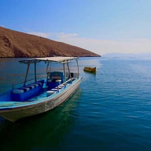 Oman Musandam Dhow Cruise: Water Sports & Buffet Lunch Shop Online at Special Price from Dubai Trades