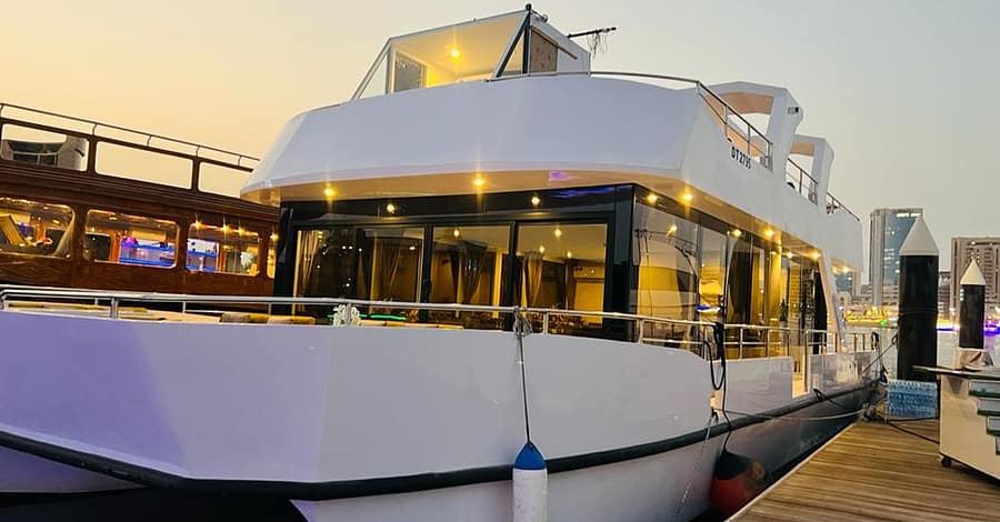 Dine, Dance, And Delight: Dubai Canal Dinner Dhow Cruise Dubai restaurants Shop Online at Dubai Trades 2