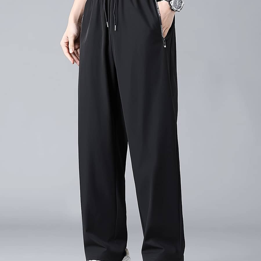 Men’s Breathable Sweat-wicking Quick-dry Loose-fit Joggers – Lightweight Summer Casual Pants With Drawstring Waist, Solid Color Black, Outdoor Activities, Sweat-resistant Casual Shop Online at Dubai Trades 2