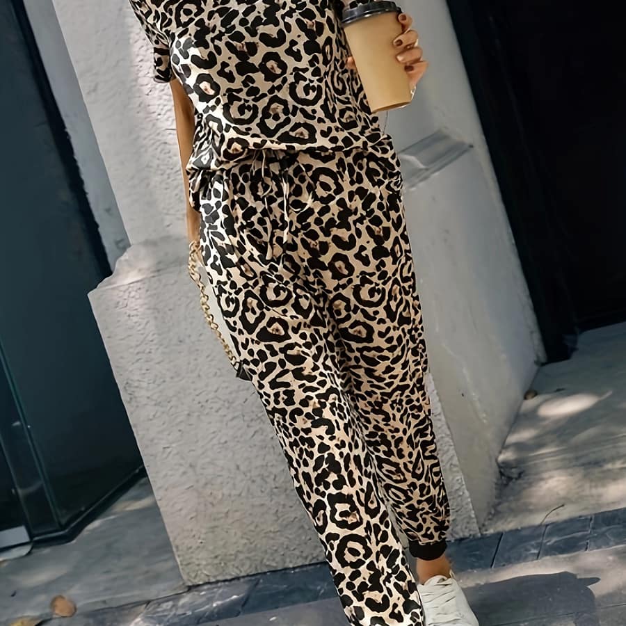 Women’s Casual Leopard Print Jumpsuit – Short Sleeve, Drawstring Waist, White Sneakers, Polyester Blend, Wear, Casual Attire | Leopard Print Jumpsuit | Drawstring Waistline Clothing Shop Online at Dubai Trades 2